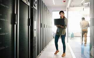 Female carrying a laptop